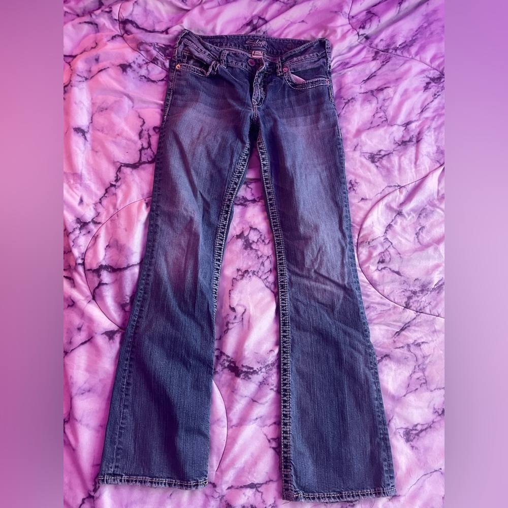 barely worn silver jeans.